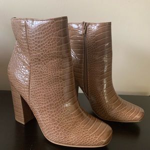 Snakeskin heeled leather booties